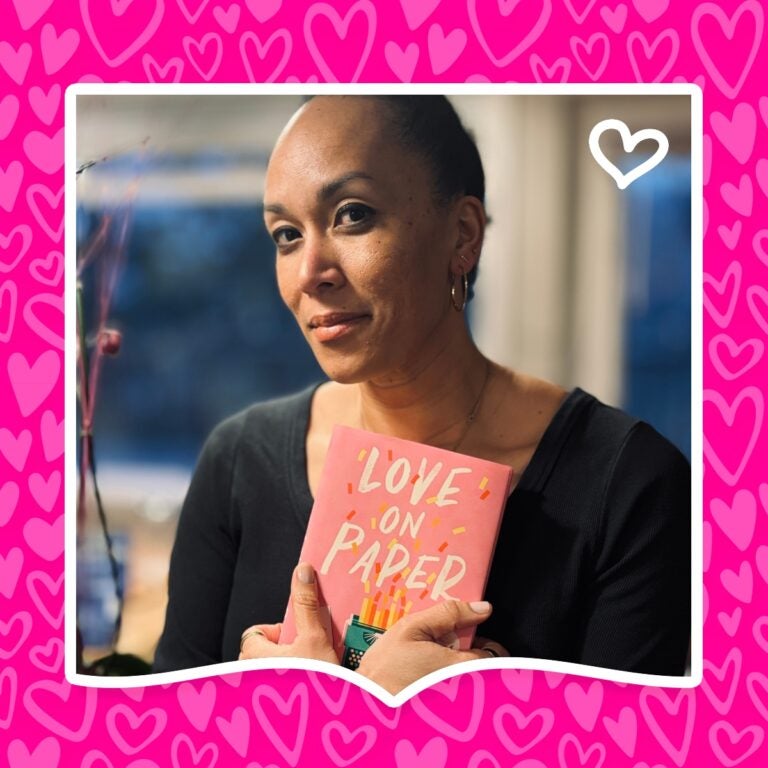 Author Danielle Parker poses with her book Love on Paper